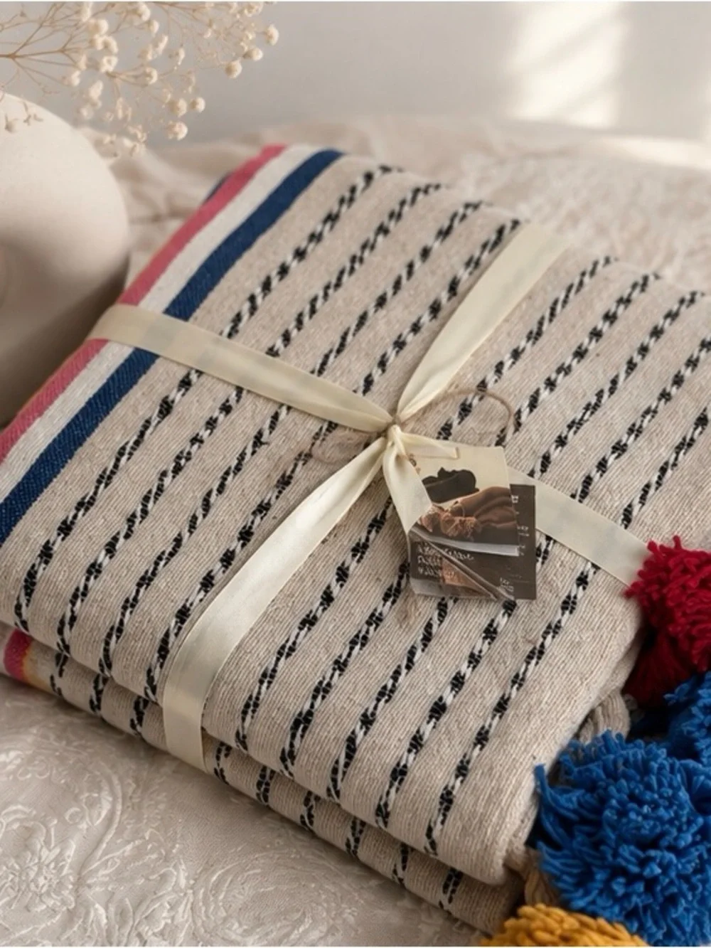 Cream Striped Throw with Multi-Colored Pom Poms